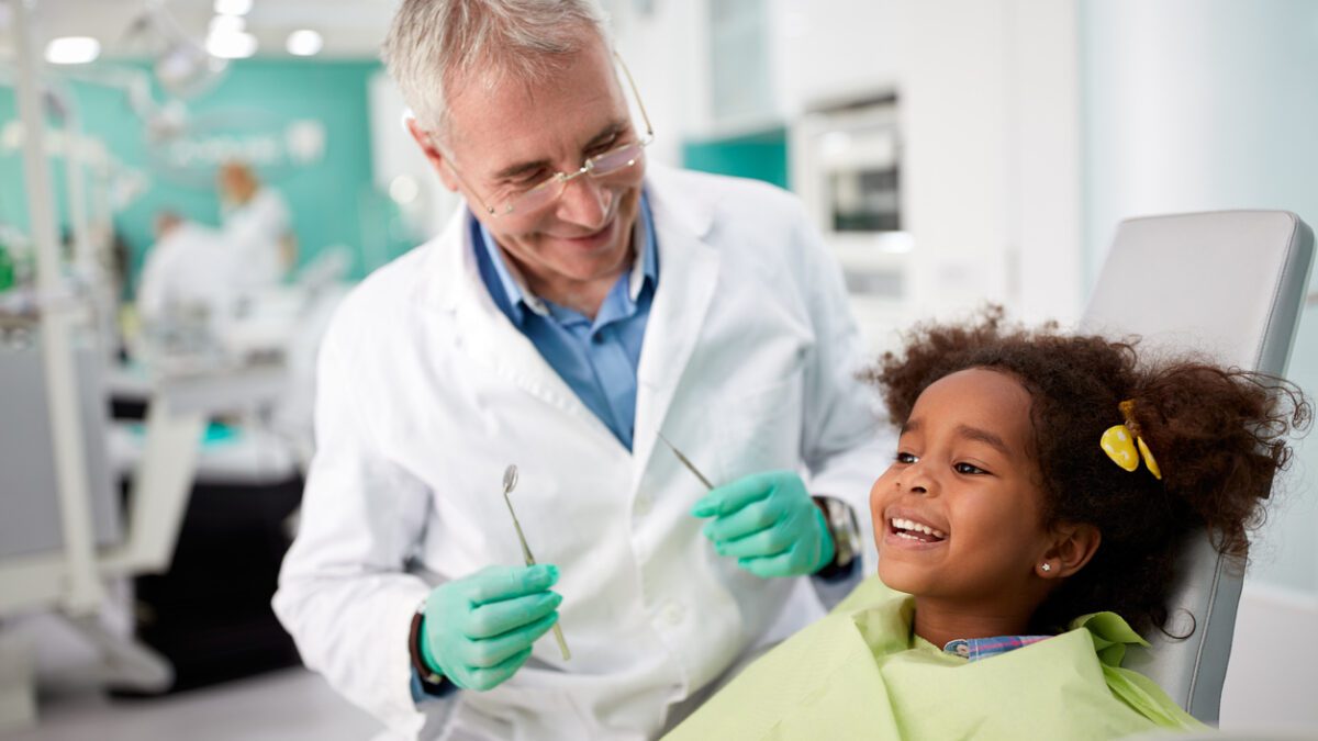 Learn how to prepare your child for their first dental visit at Village Family Dental.